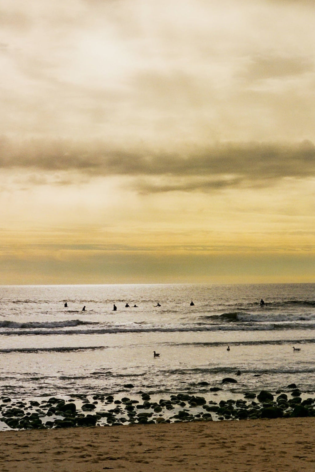 foggy new years day, Montauk ny. ditch plains surfers. 